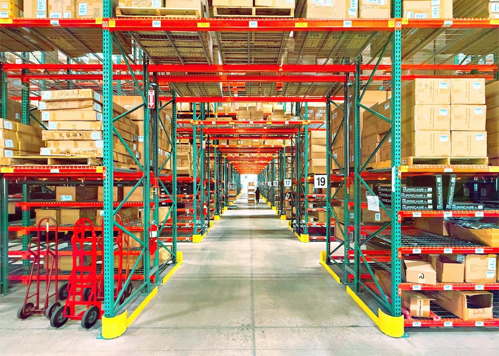 Warehouse aisle with racks of boxed goods